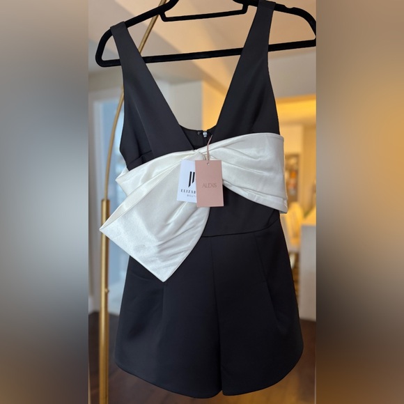 NWT Alexis Black Satin Romper with White Bow